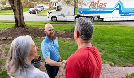 Atlas Agent shaking hands with homeowner